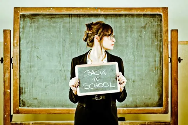 A Grown up continues education in school