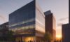 Students walking between modern brick and glass buildings on a vibrant university campus at sunset.