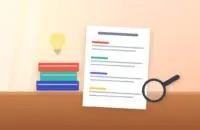 Research paper outline with colored sections next to a stack of books, a light bulb and a magnifying glass