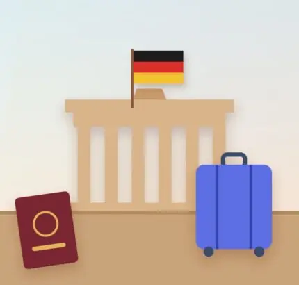 Classic German city gate with the German flag, a passport and a suitcase
